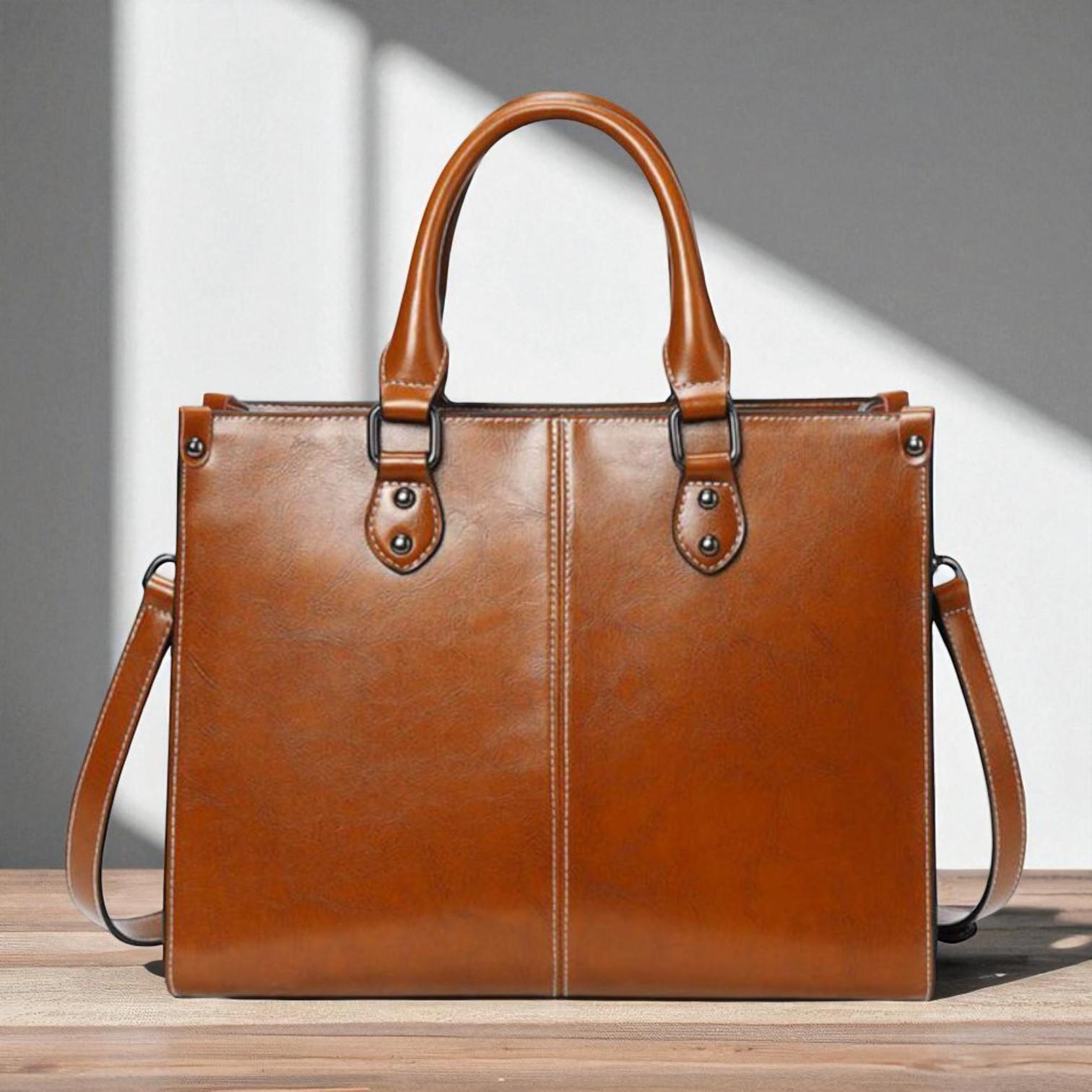 Elegantiška nešiojamoji rankinė - klasikinė ir funkcionali