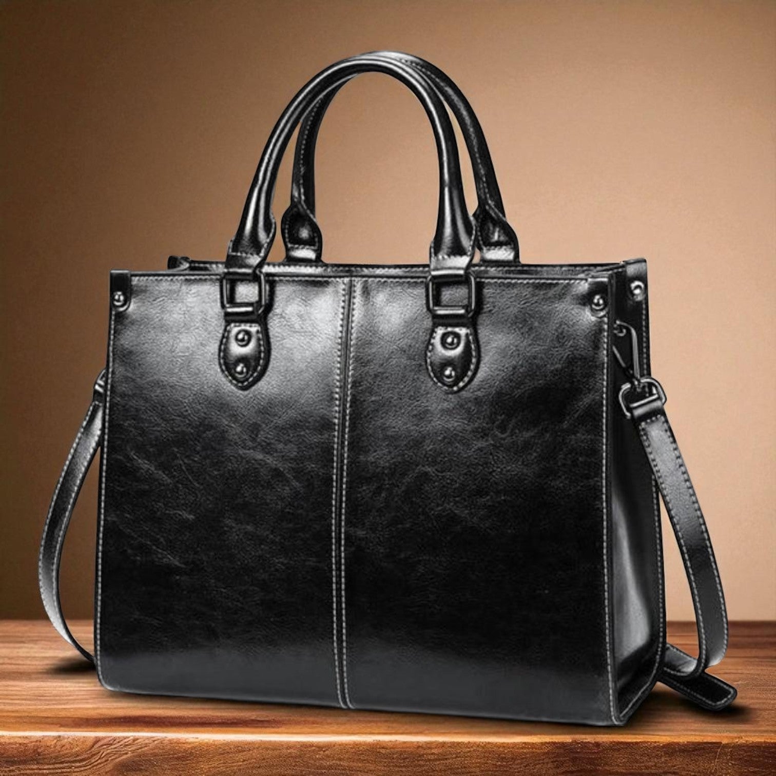 Elegantiška nešiojamoji rankinė - klasikinė ir funkcionali