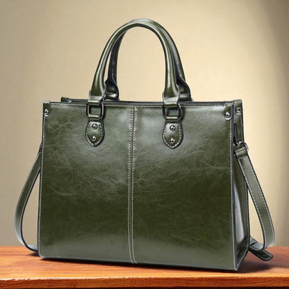 Elegantiška nešiojamoji rankinė - klasikinė ir funkcionali